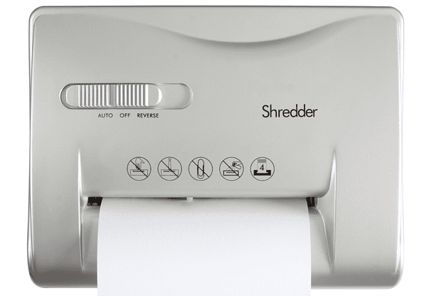 Top view of a paper shredder with a sheet of paper being shredded.