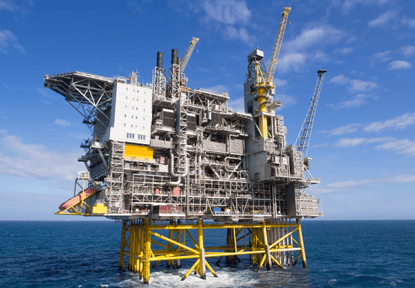 Large offshore oil platform in the ocean.