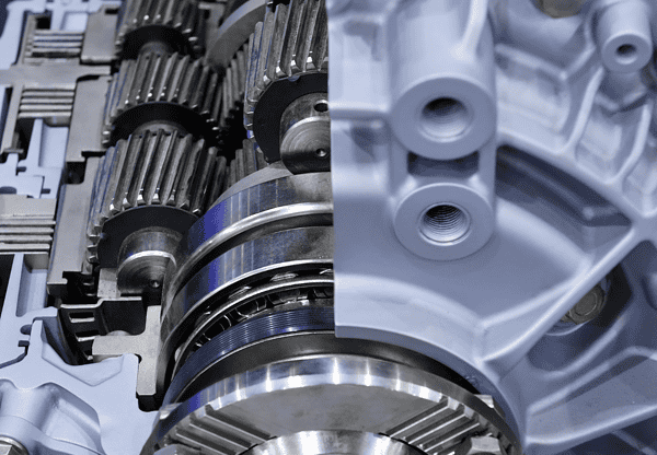 Close-up view of mechanical gears and components inside a machine.