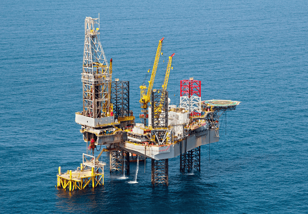 Offshore oil rig platform in the middle of the ocean.