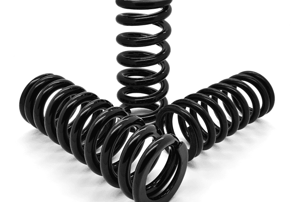 Three black coil springs arranged in a triangular formation.