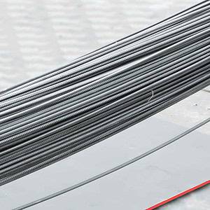 Coiled 4140 steel bars, showcasing their durability and versatility for various industrial applications.