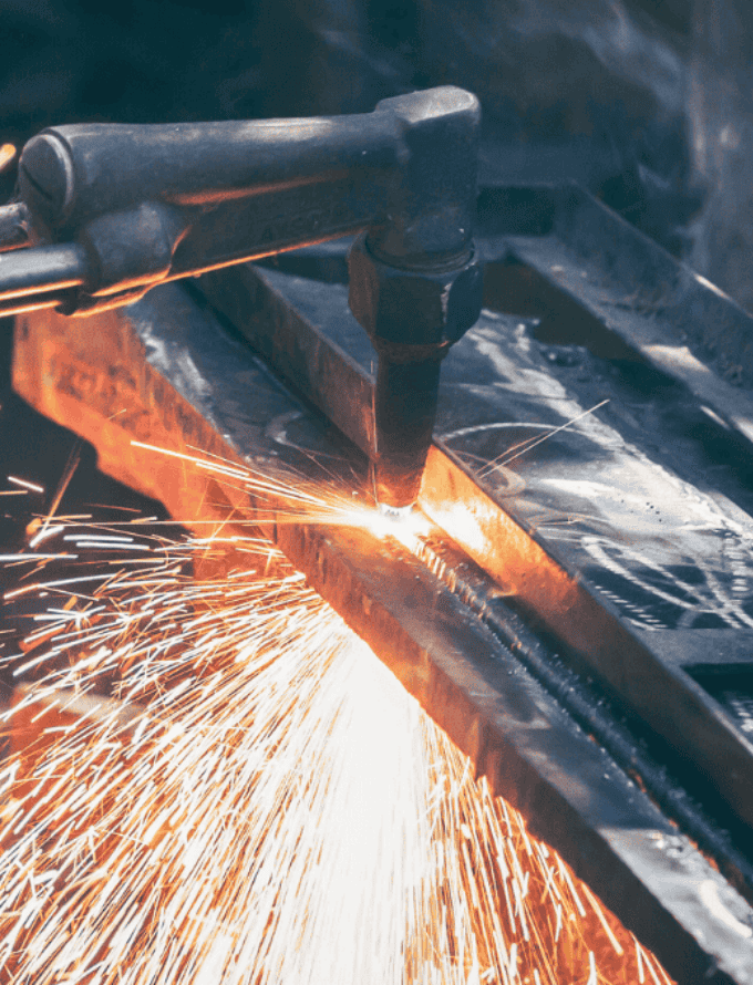 a person welding a piece of metal