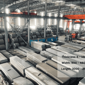 A large number of SB450 Steel plates are neatly stored in the warehouse.