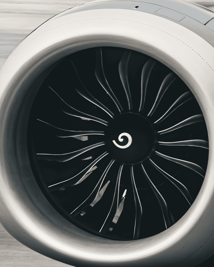 A close-up of a jet engine turbine, showcasing the precision and strength of cold rolled steel bars used in aerospace engineering.