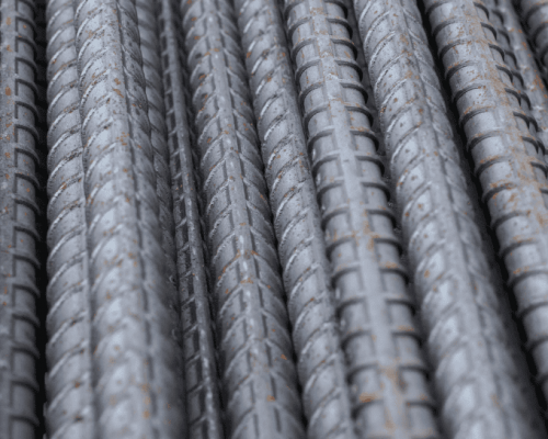 Close-up view of hot rolled steel bars.