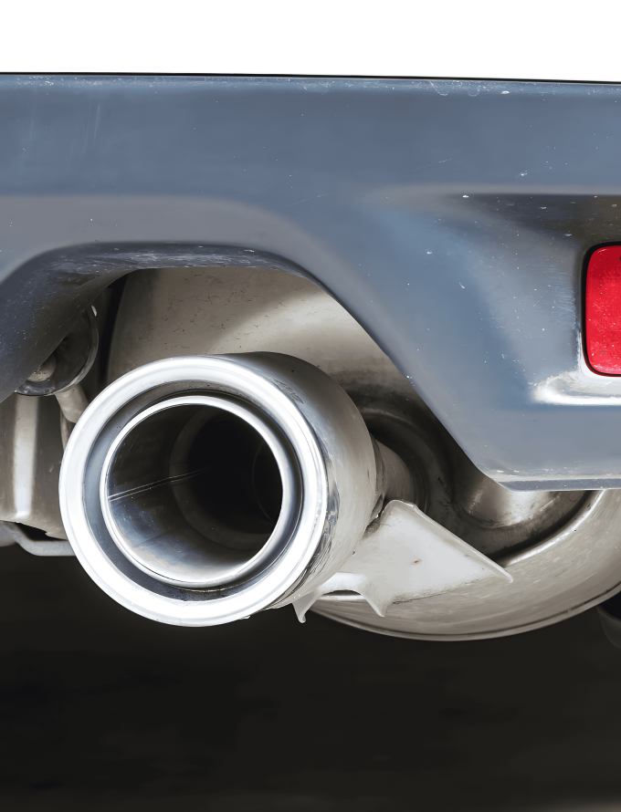 Close-up of a stainless steel car exhaust pipe.