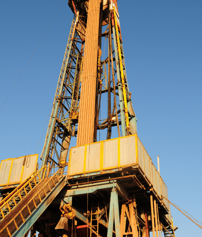 An oil drilling rig made of high-strength steel bars, showcasing the robust and intricate structure essential for heavy-duty operations.