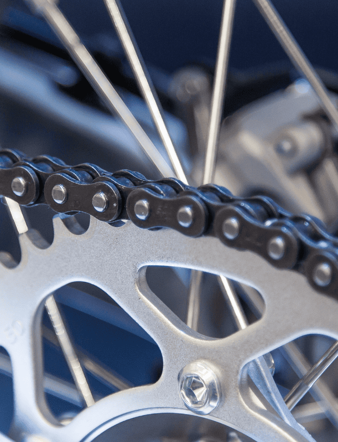 Close-up of a bicycle chain and gear mechanism.