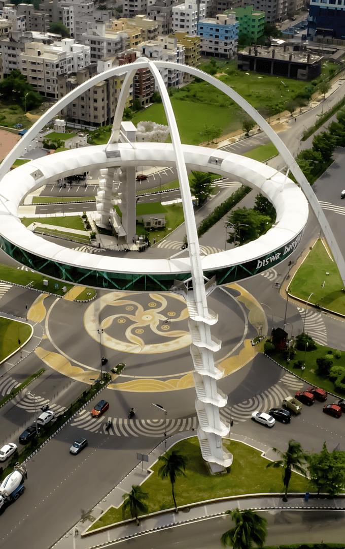 Steel bar-reinforced circular structure in a busy urban area.